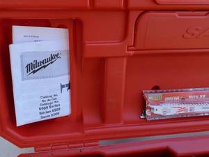 lot 100 image: Milwaukee Sawzall with Extra Saw Blades & Case
