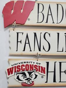 lot 330 image: Wisconsin Badger Fan Wall Decor