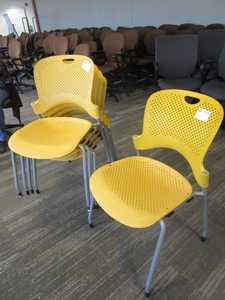 lot 215 image: HERMAN MILLER BRIGHT YELLOW STACKING CAFE CHAIRS