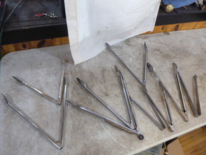 lot 16 image: 9 Pair of Tongs