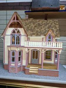 lot 2 image: Beautiful French Colonial Handmade Dollhouse
