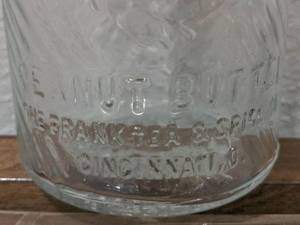 lot 83 image: 1 Pound Jumbo Peanut Butter Jar, Frank Tea & Spice Co.