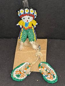 lot 114 image: Handmade Beaded Figure Pendant and Mini Moccasins