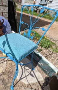 lot 29 image: Charming Vintage Wrought Iron Patio Set with Scrolled Leaf Design