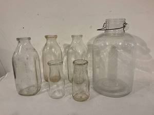 lot 122 image: Vintage Glass Milk Bottles