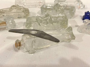 lot 145 image: Vintage Glass Cars and Airplanes