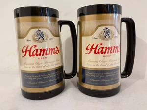 lot 186 image: Two Vintage Plastic Hamms Mugs