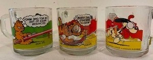 lot 195 image: 3 Vintage Garfield Glasses
