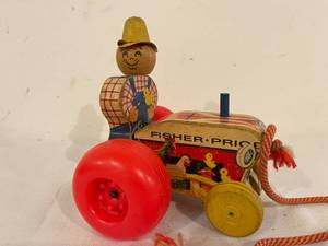 lot 355 image: Vintage Fisher Price Tractor Pull Toy