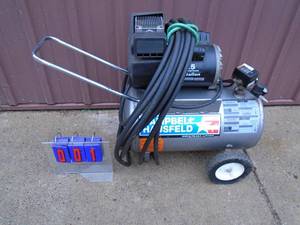 Campbell Hausfield air compressor with air hose. 11 gallon. Good used condition. Tested & works. As shown.