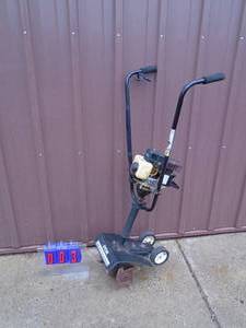 Ryobi 2 cycle mini tiller. Used condition. Tested & works. As shown.