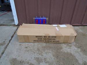 Agrifab model 45-0266 cultivator. Looks new in box. Needs assembly. Completeness unknown. As shown.