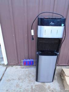Vitapur hotcold dispenser. Sounds like its running when plugged & but unable to fully test. As shown.