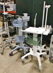 lot 46 image: Large Lot Of Mobile Medical Stands Most With Baskets - Great For Parts Or Repurposing