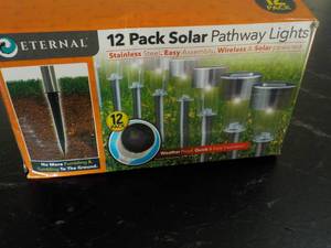 lot 74 image: Eternal 12 pack Solar Pathway Light...