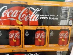 lot 253 image: 4 - 12 pkgs Coca Cola Orange Vanill...