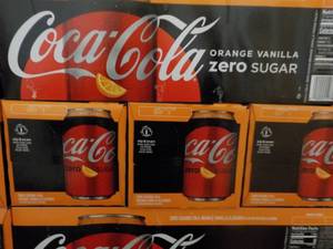 lot 254 image: 4 - 12 pkgs Coca Cola Orange Vanill...