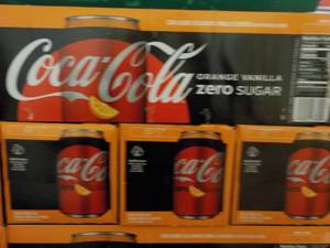 lot 255 image: 4 - 12 pkgs Coca Cola Orange Vanill...
