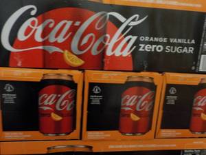 lot 256 image: 4 - 12 pkgs Coca Cola Orange Vanill...