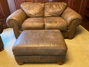 lot 11 image: Three Piece Leather Furniture Grouping Love Seat, Chair and Ottoman