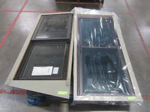 lot 133 image: Pair of Custom Slant Sliding Aluminum Windows - Frame Approximately 47 58 x 22.