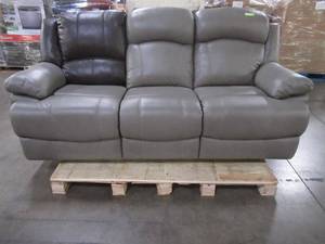 lot 136 image: Abbyson Clarence Leather Reclining Sofa in Gray, CX6118-GRY-3 - Mismatched LH Back Cushion in Brown..