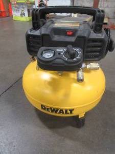 lot 14 image: Dewalt 6 Gal. 18-Gauge Brad Nailer and Heavy-Duty Pancake Electric Air Compressor Combo Kit (1-Tool) DWFP1KIT - Works Well.
