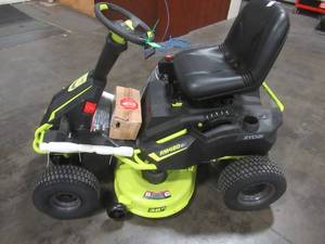 lot 3 image: Ryobi 38 in. 100 Ah Battery Electric Rear Engine Riding Lawn Mower RY48111 - Missing Charger - Some Plastic Shell Damage - RUNS GREAT