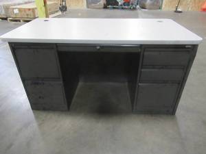 lot 153 image: Sandusky 6 Drawer Steel Desk with Laminate Top - 1 Drawer off glides, missing key. Used in warehouse.