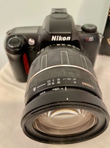 2 Nikon Cameras and a Promaster FTD 7000M Electronic Flash