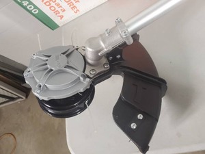 lot 25 image: New Core Power-Lok Lithium Ion String Trimmer - No Charger