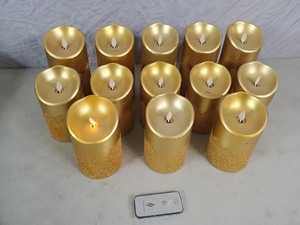 lot 137 image: 13 Luminara Flameless Pillar Candles with Universal Remote