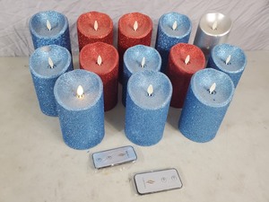 lot 138 image: 13 Luminara Flameless Pillar Candles with Universal Remote