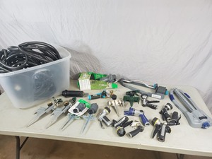 lot 144 image: Garden Hose, Sprayers, Sprinklers, and More
