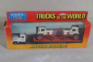 ERTL Trucks of the World Case Flatbed and Tractor Set