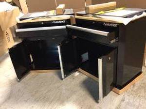 Lot of 2 Ready-to-Assemble 24-Gauge Steel 1-Drawer 2-Door Garage Base Cabinet in Black (28 in. W x 33 in. H x 18 in. D) by Husky Custolmer Returns See Pictures
