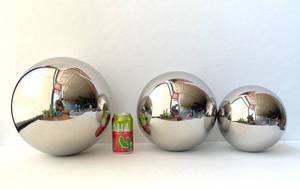 Lot of three large Bola polished decorative glass spheres