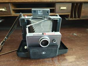 lot 42 image: Polaroid Land Camera Automatic 100 With Case