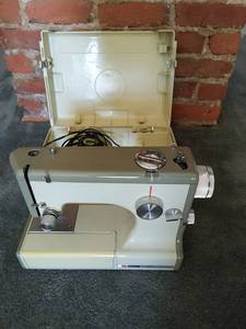 lot 43 image: Old Sears Kenmore Sewing Machine