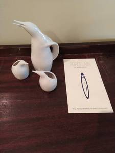 lot 142 image: Penguin Pitcher and Two Porcelain Cups by Robin Berry (UMN Alumni Artist)
