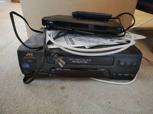 lot 265 image: VHS and DVD Players with Remotes