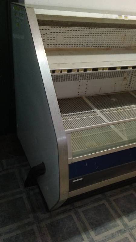 lot 11 image: 12 ft. Open Cooler. Works Great, Meat Cooler. Includes Black Rubber Display Gauze.