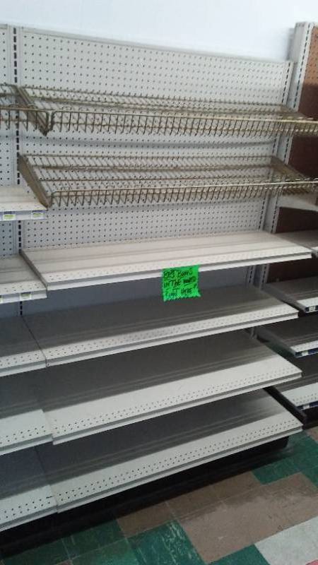 lot 17 image: 4 Ft. Sections of Shelving (3) includes some wire Bread Racks