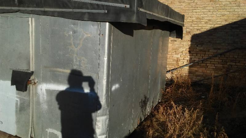 lot 83 image: Metal storage shed