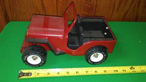 lot 198 image: Tonka Jeep  Restored in Red.