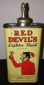 lot 256 image: Vintage Red Devils Lighter Fluid.