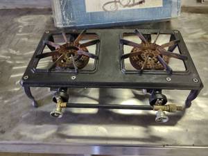 lot 10 image: Two Burner Cast Iron LP Gas Stove, ...