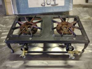 lot 12 image: Two Burner Cast Iron LP Gas Stove, ...