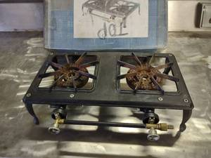 lot 14 image: Two Burner Cast Iron LP Gas Stove, ...