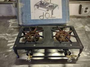 lot 16 image: Two Burner Cast Iron LP Gas Stove, ...